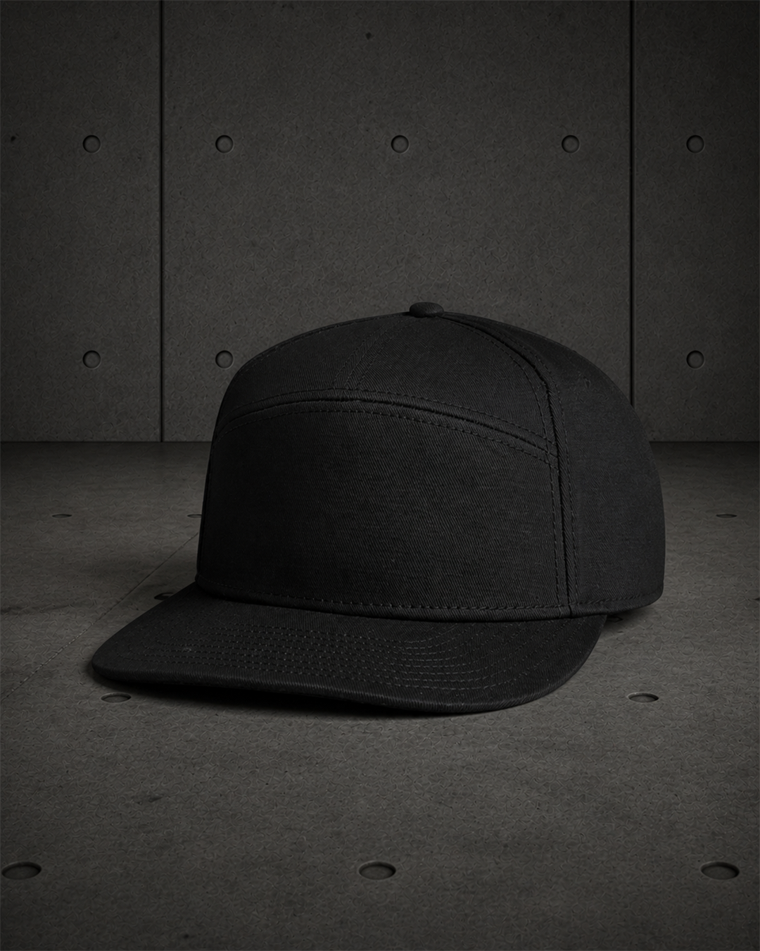Stock 7-Panel Cap 1184 blank product on dark industrial concrete background