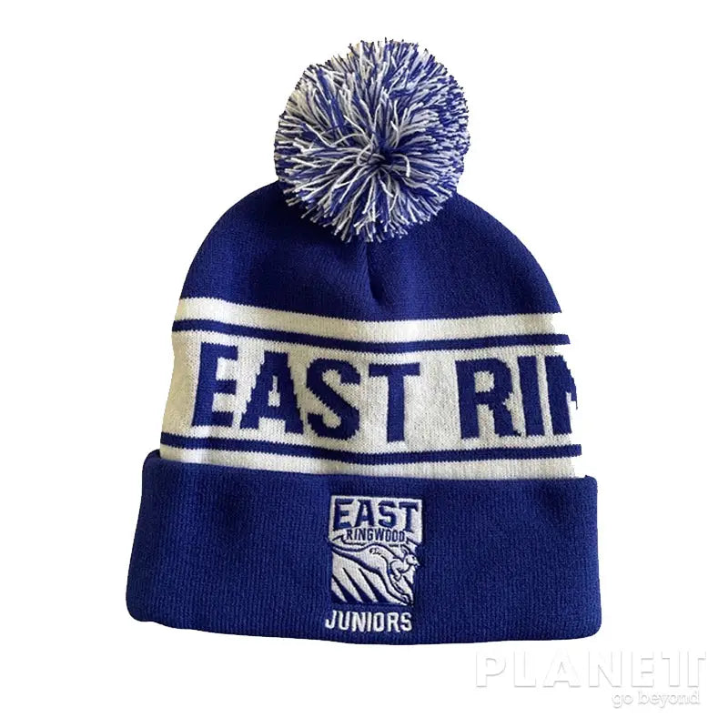 Blue and white knit beanie with pompom.
