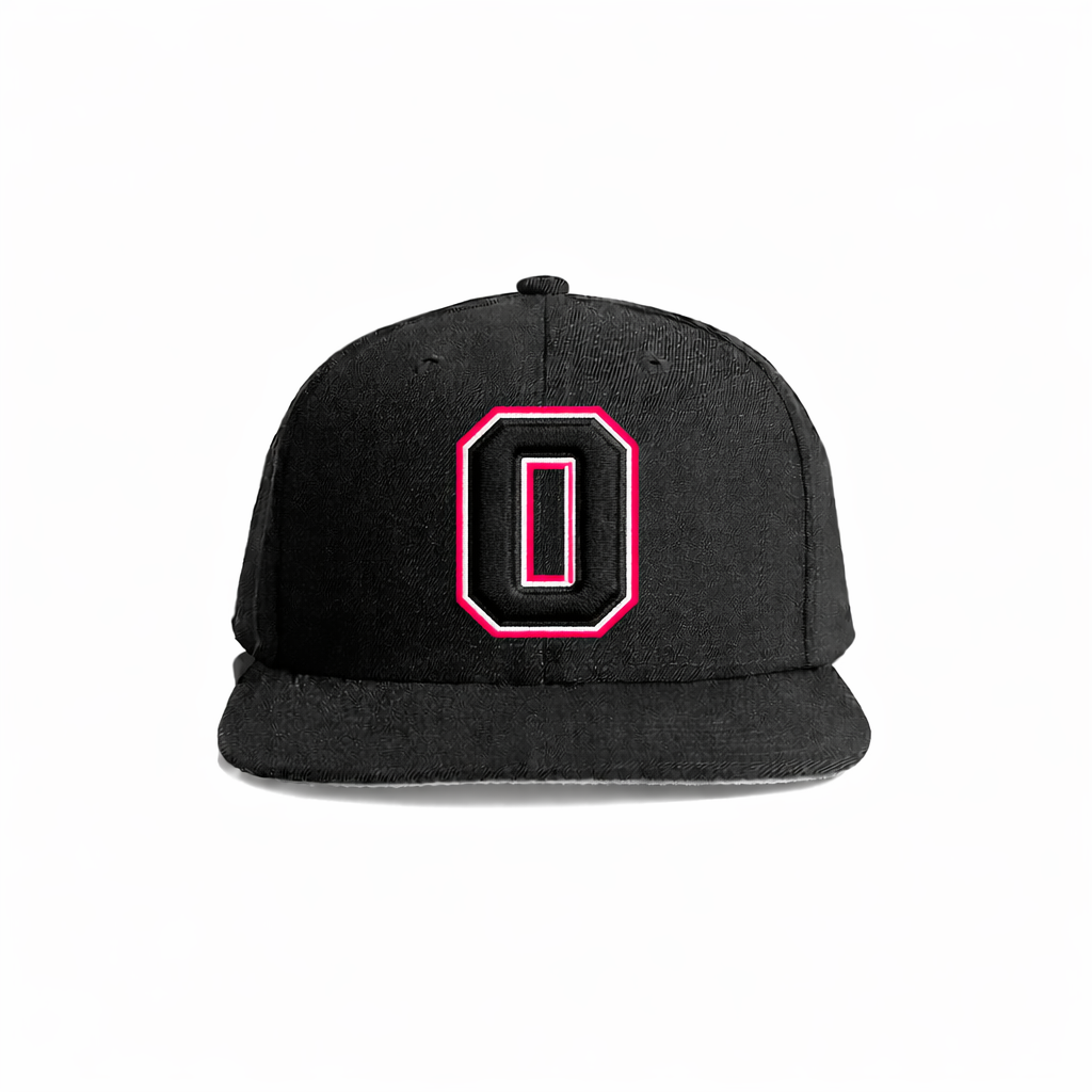 Black snapback cap featuring a bold pink and white embroidered letter ’o’ on the front.