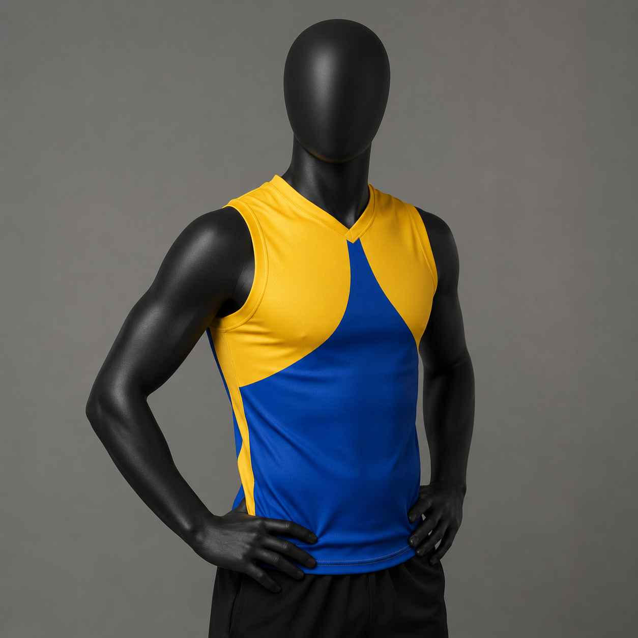 A sleeveless athletic tank top displayed on a black mannequin torso against a plain gray studio background. The shirt has a color-block design with bright yellow on the upper chest and shoulder area and royal blue on the lower body and side panels.