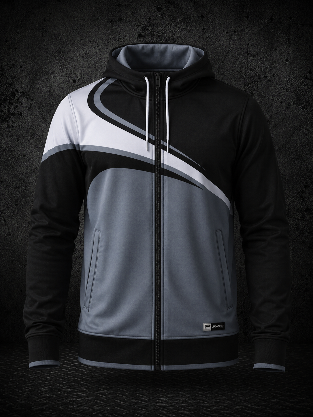Black, gray, and white hoodie with a geometric design on a dark background