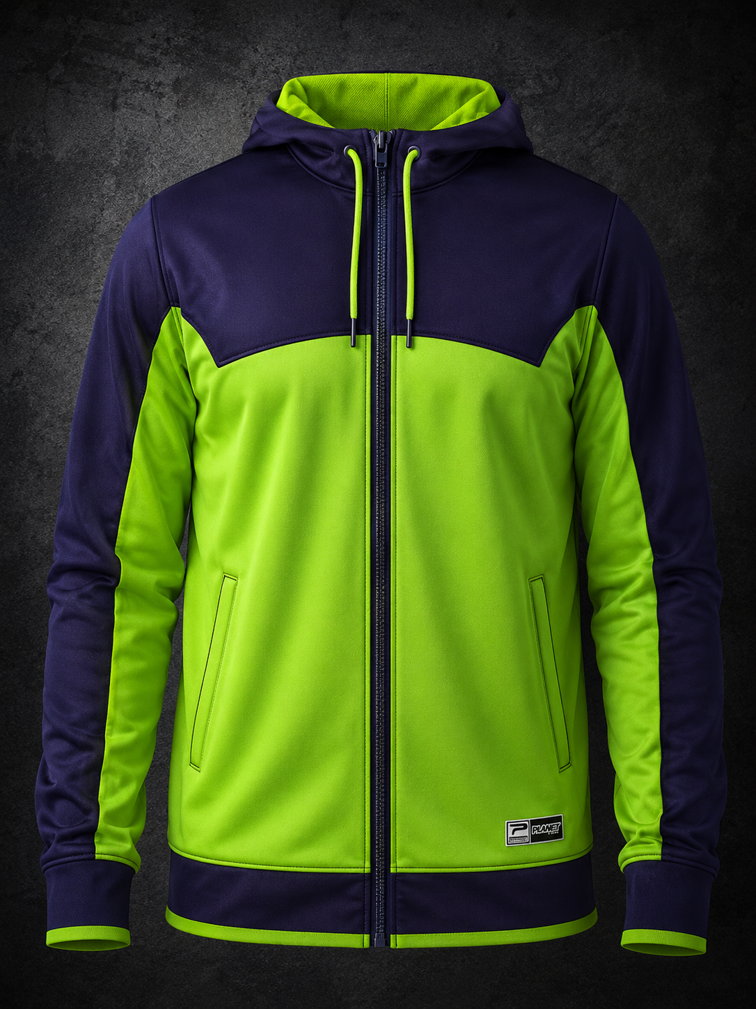 Green and navy jacket with a zipper on a dark background
