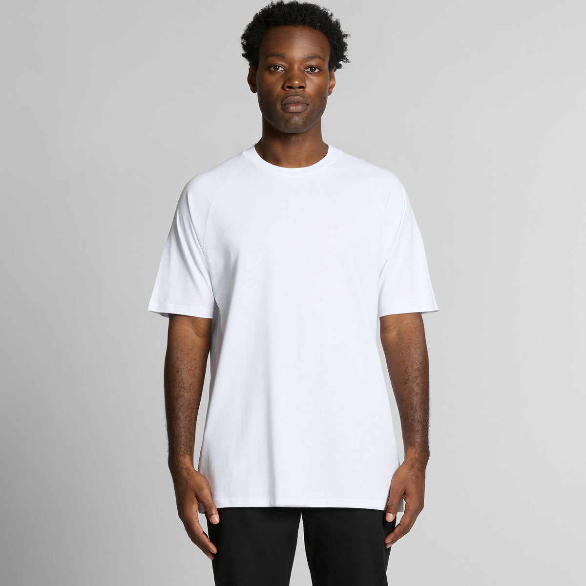 White crew neck t-shirt with short sleeves and a relaxed fit.