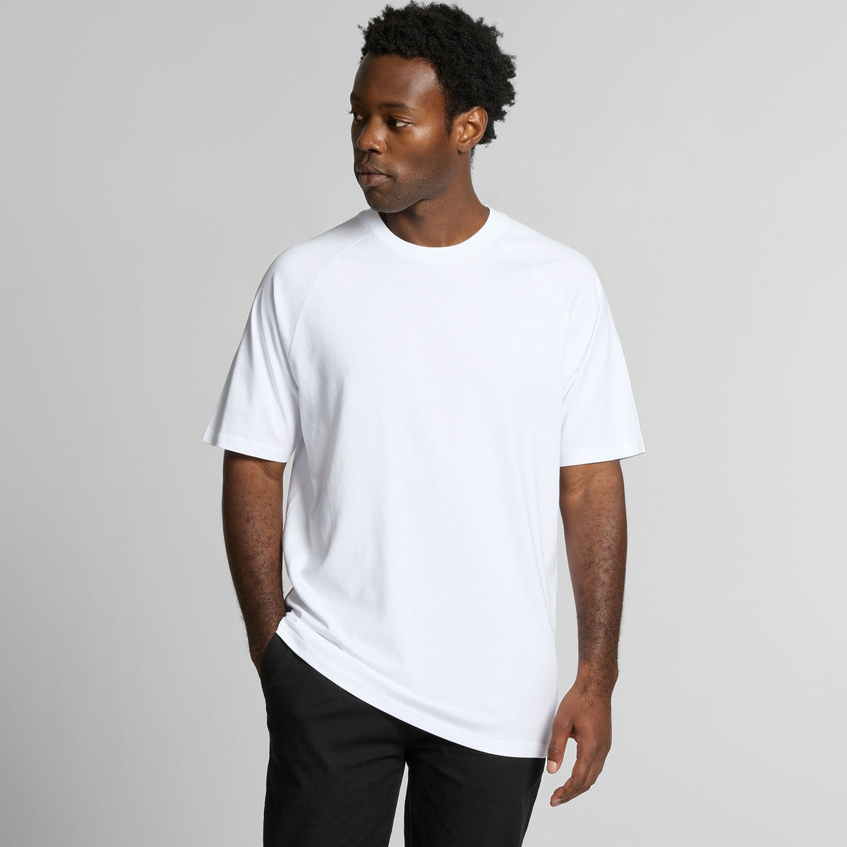 White crew neck t-shirt with curved hem and short sleeves.