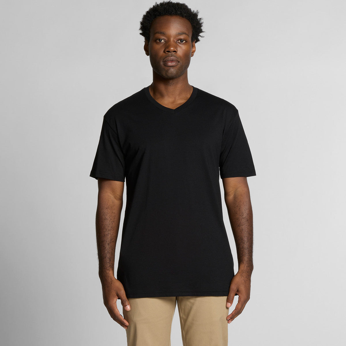 Black v-neck t-shirt with ribbed neckline and short sleeves, made of cotton.