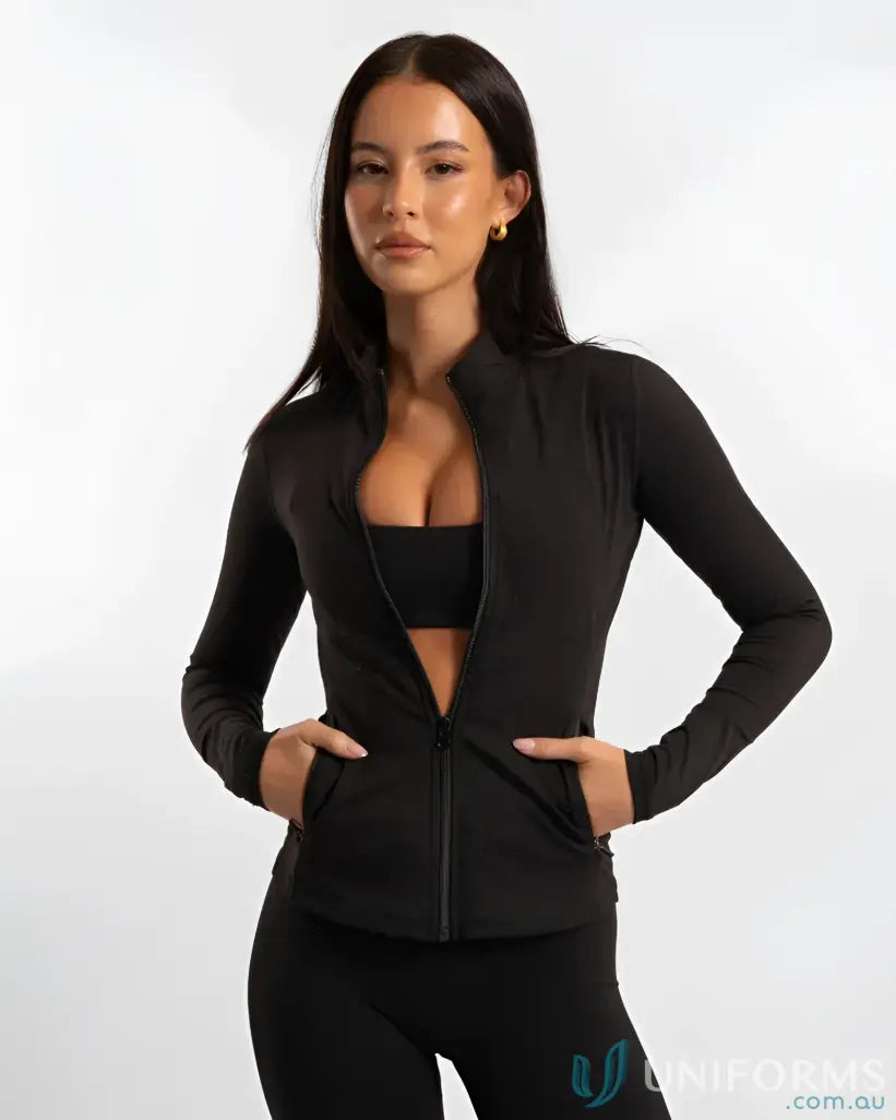 Black zip-up athletic jacket with a modern design and stretch material.