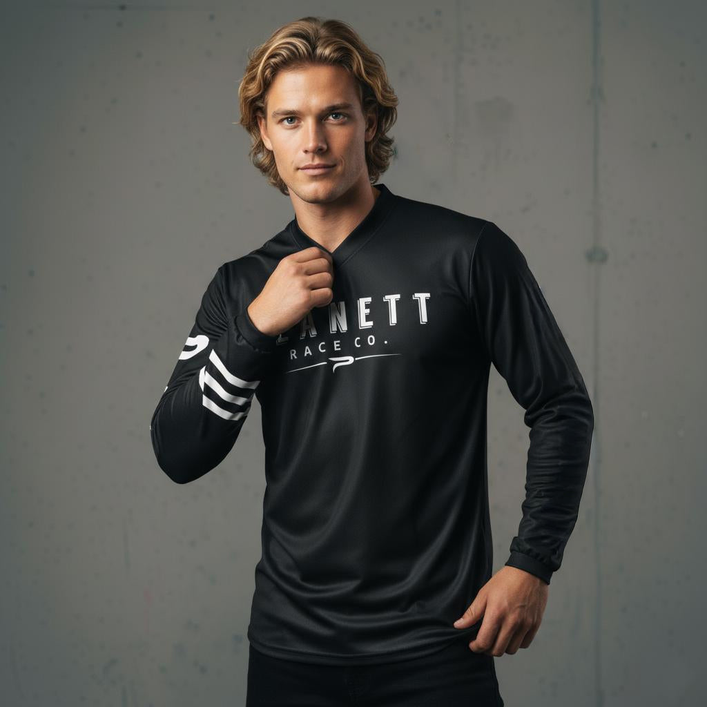 Black long-sleeved athletic shirt with white stripes on the left arm.