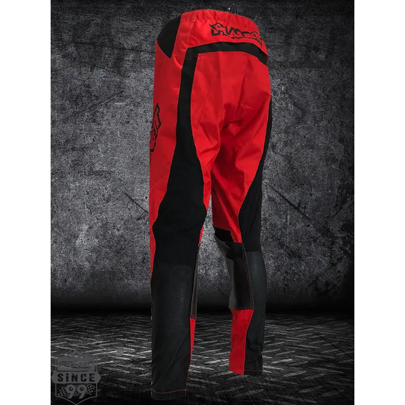 Red and black motocross pants.
