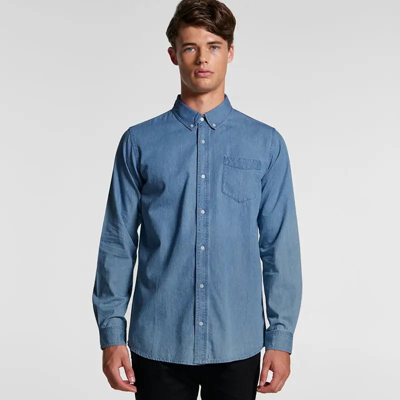 Light blue denim button-down shirt.