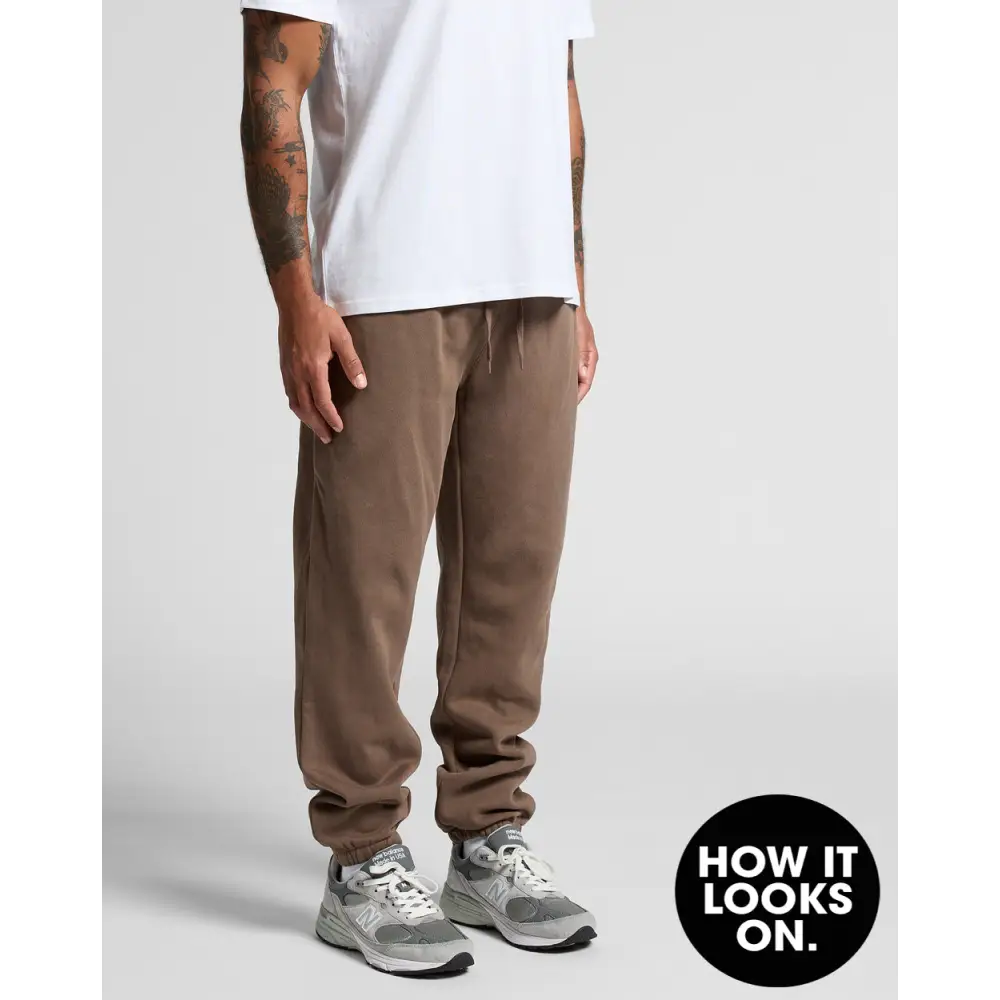 Brown sweatpants with white drawstring.
