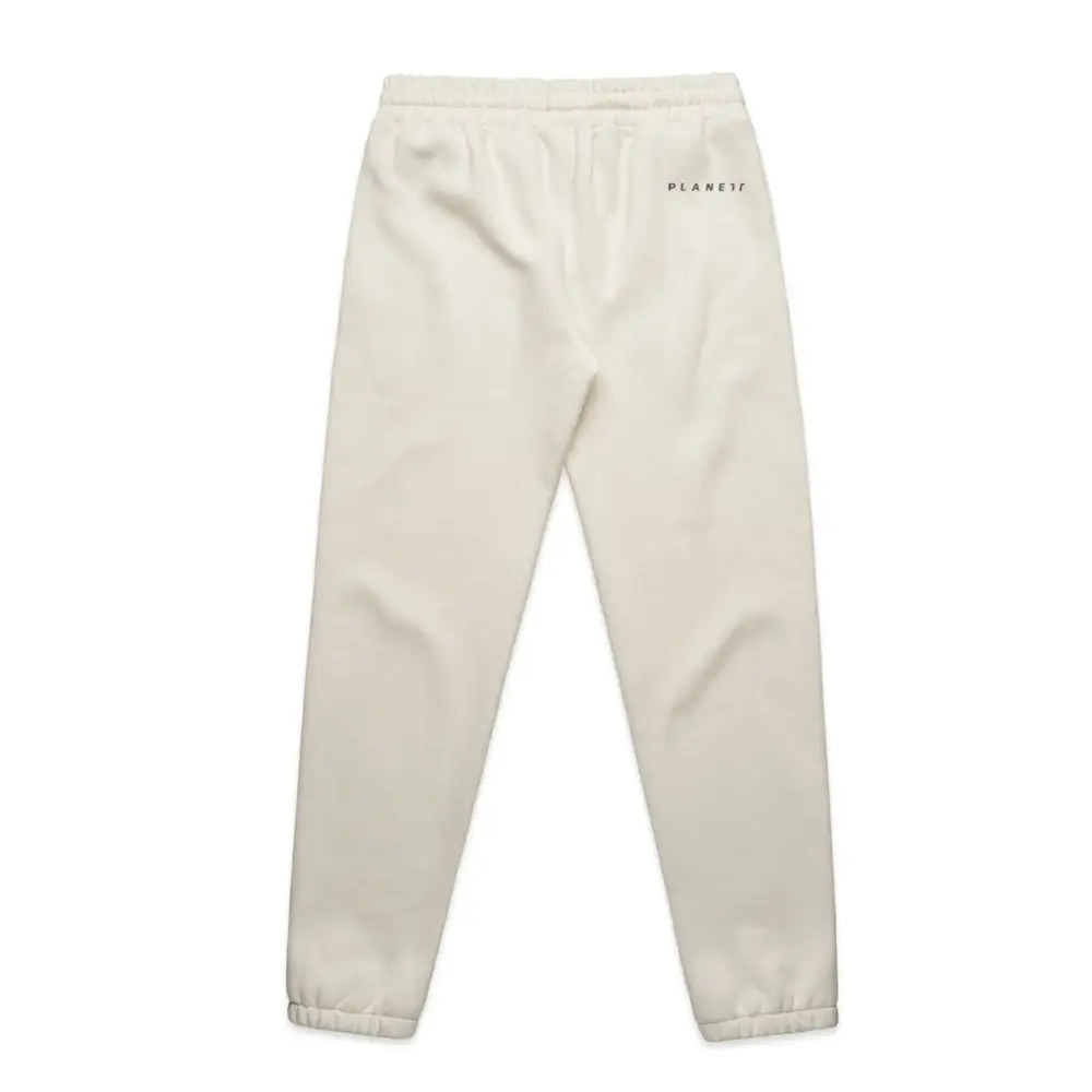 Cream-colored sweatpants.