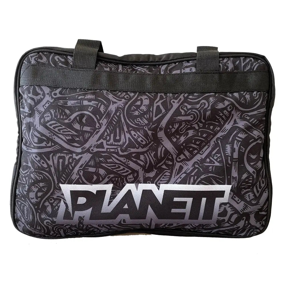 Black and gray patterned bag with handles.