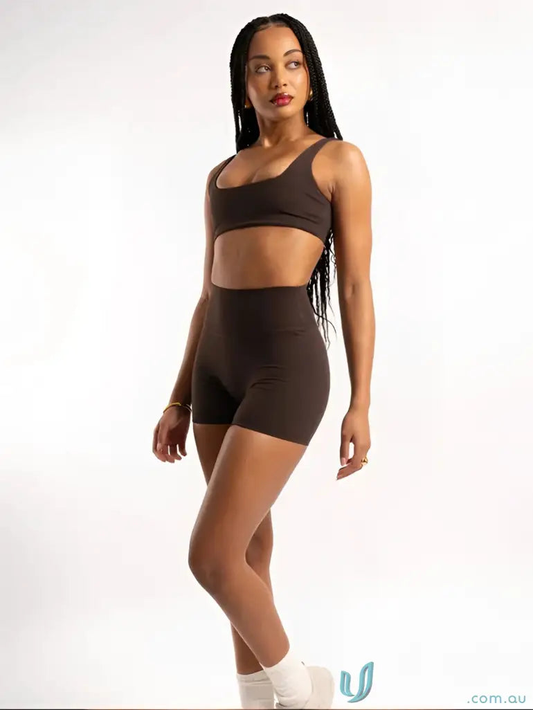 Brown high-waisted shorts with a sleek design and soft material.