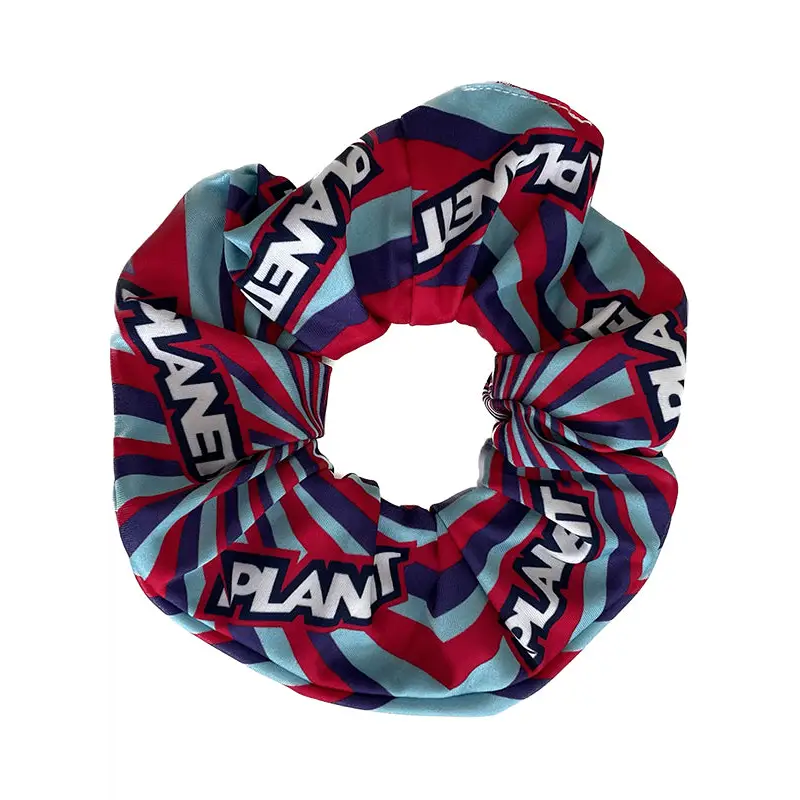 Colorful scrunchie with ’PLANET’ text.