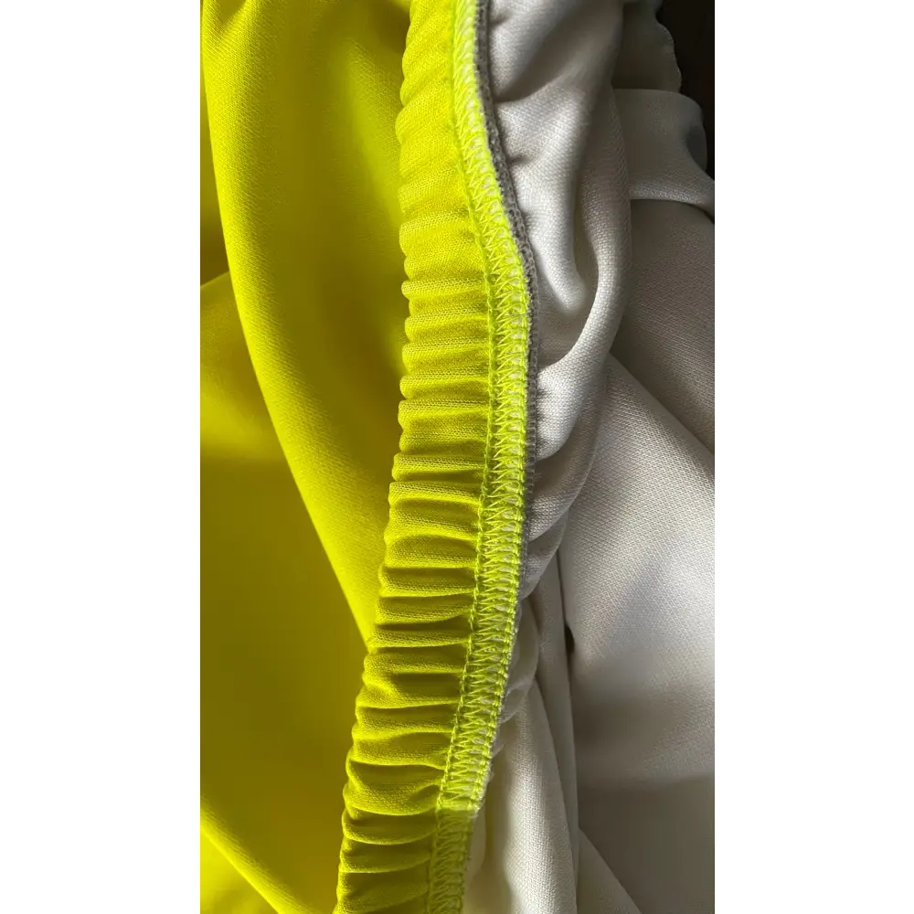 Yellow and white elastic fabric.