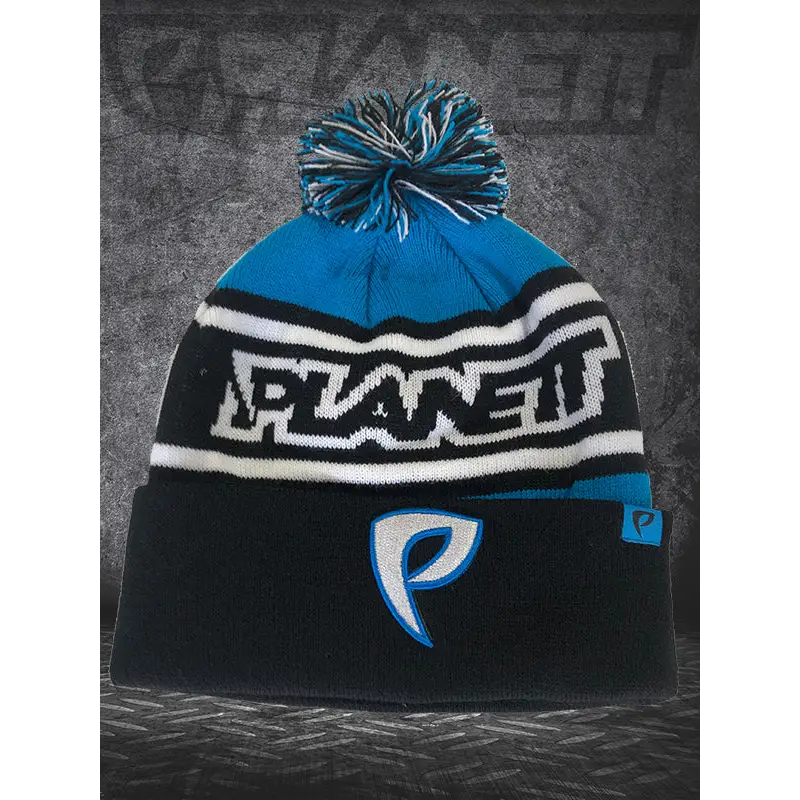 Blue and black knit beanie with pompom.