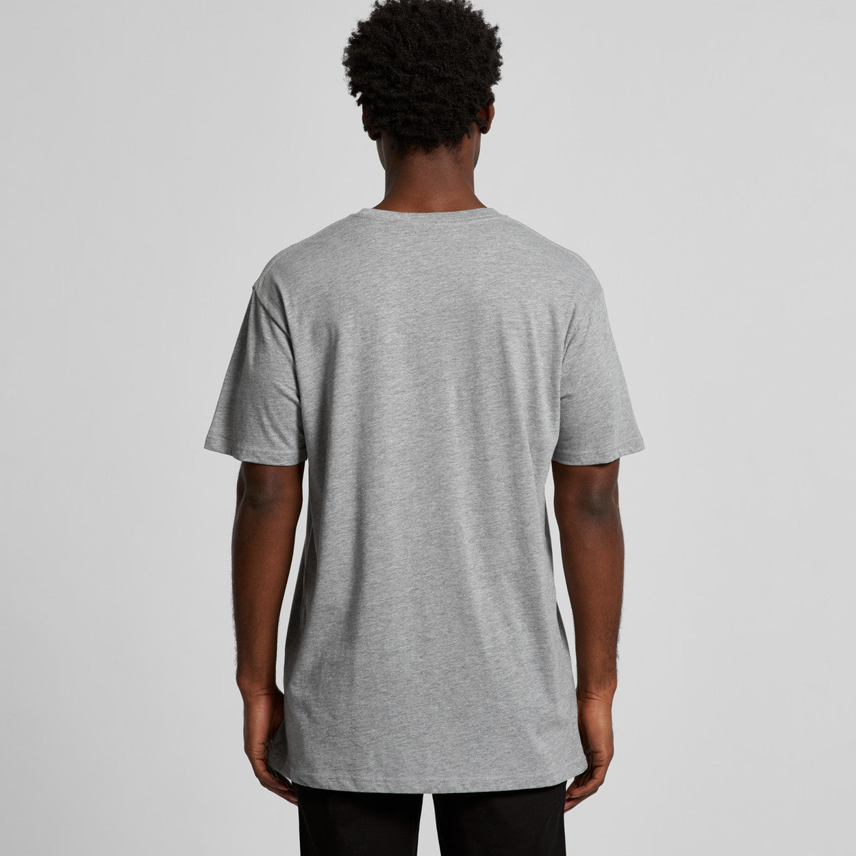 Gray nike dri-fit t-shirt with black pants and white logo on back.