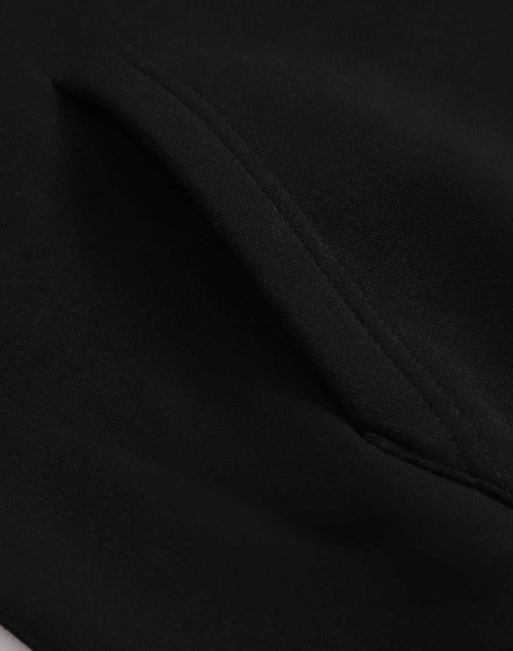 Black fabric with a seam.