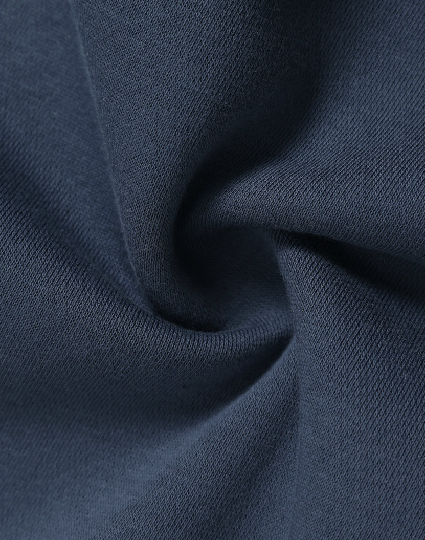 Wrinkled blue fabric.