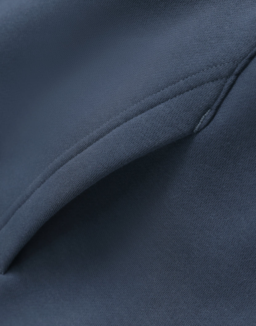 Blue fabric pocket detail.