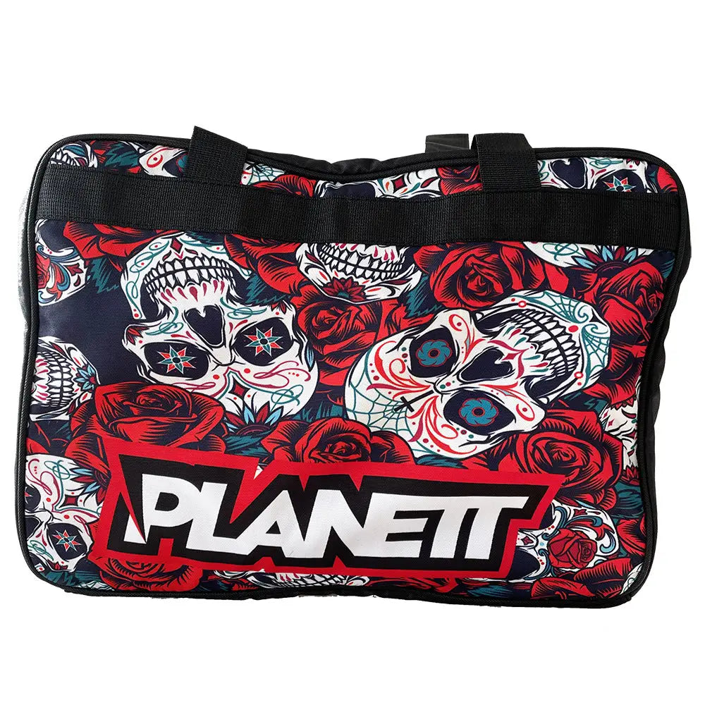 Skull and rose patterned duffel bag.