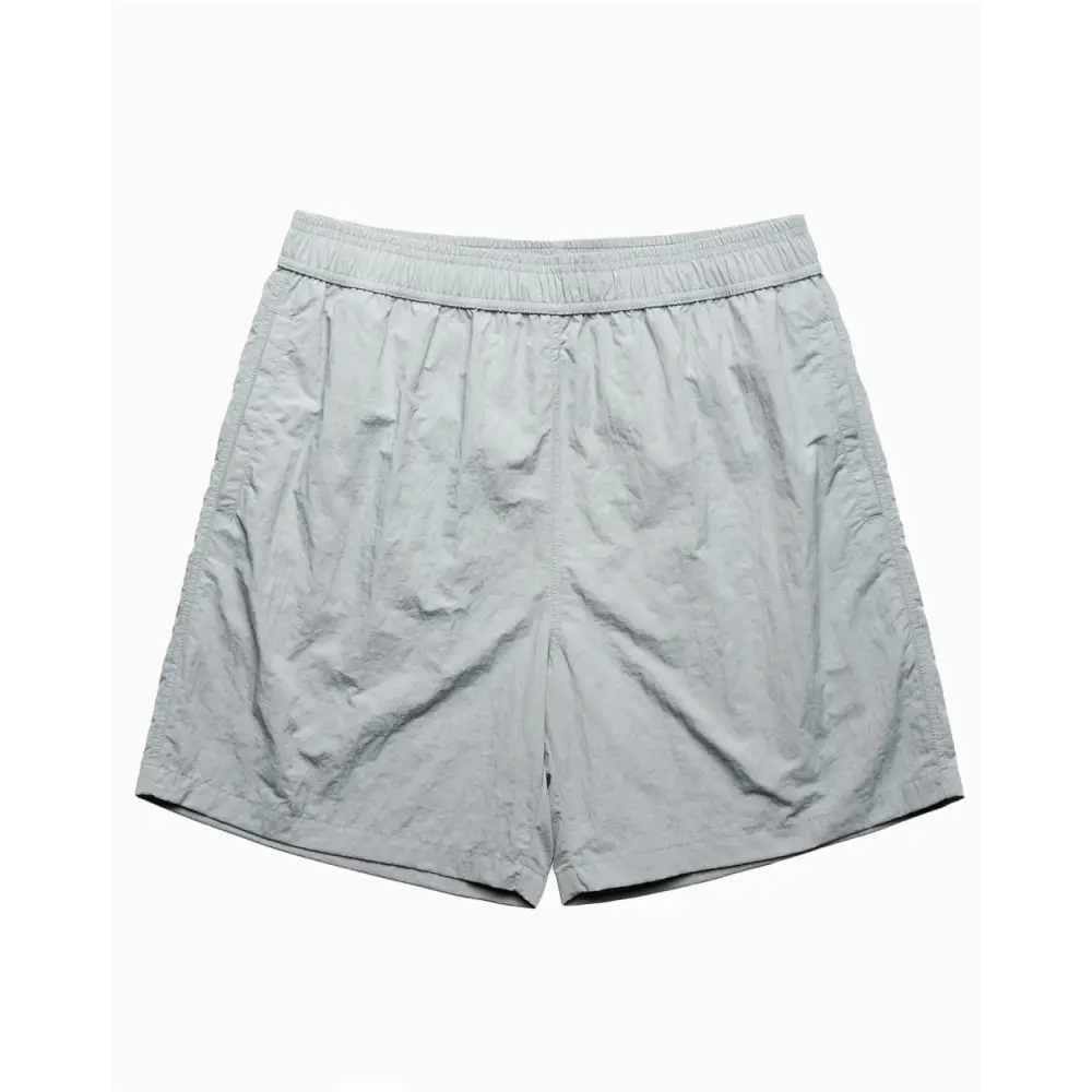 Gray nylon shorts.