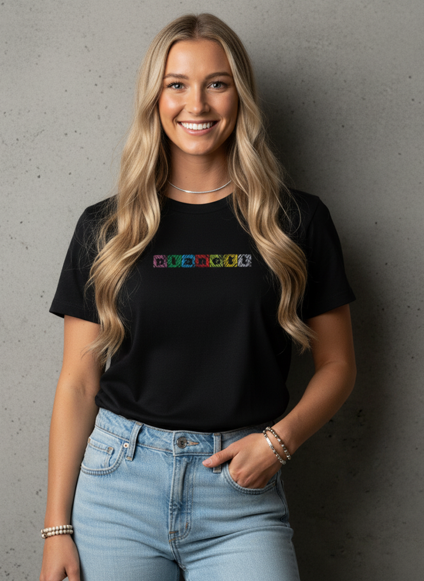 A woman wearing a black t-shirt and light blue jeans.