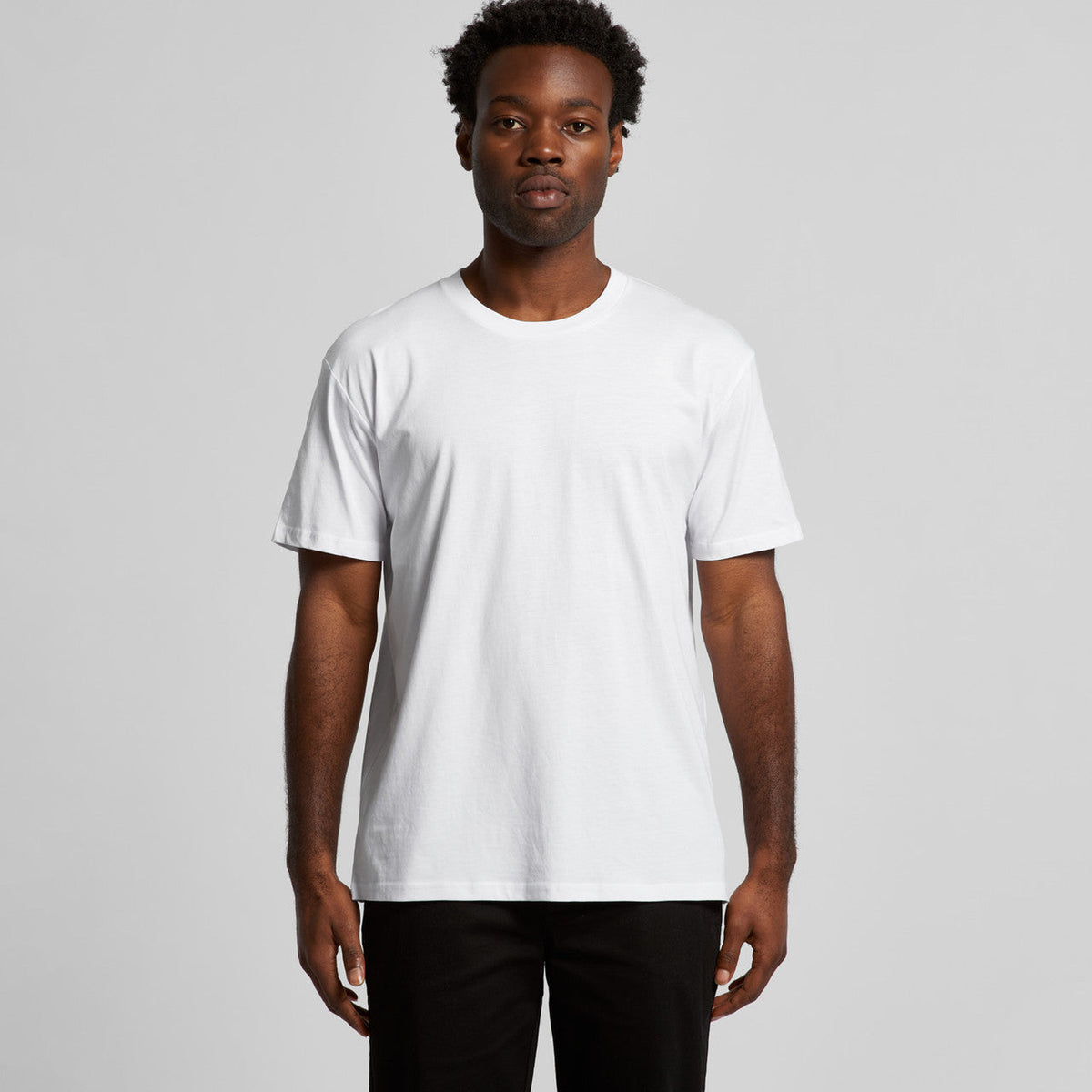 White crew neck t-shirt with short sleeves and a pocket on the left side.