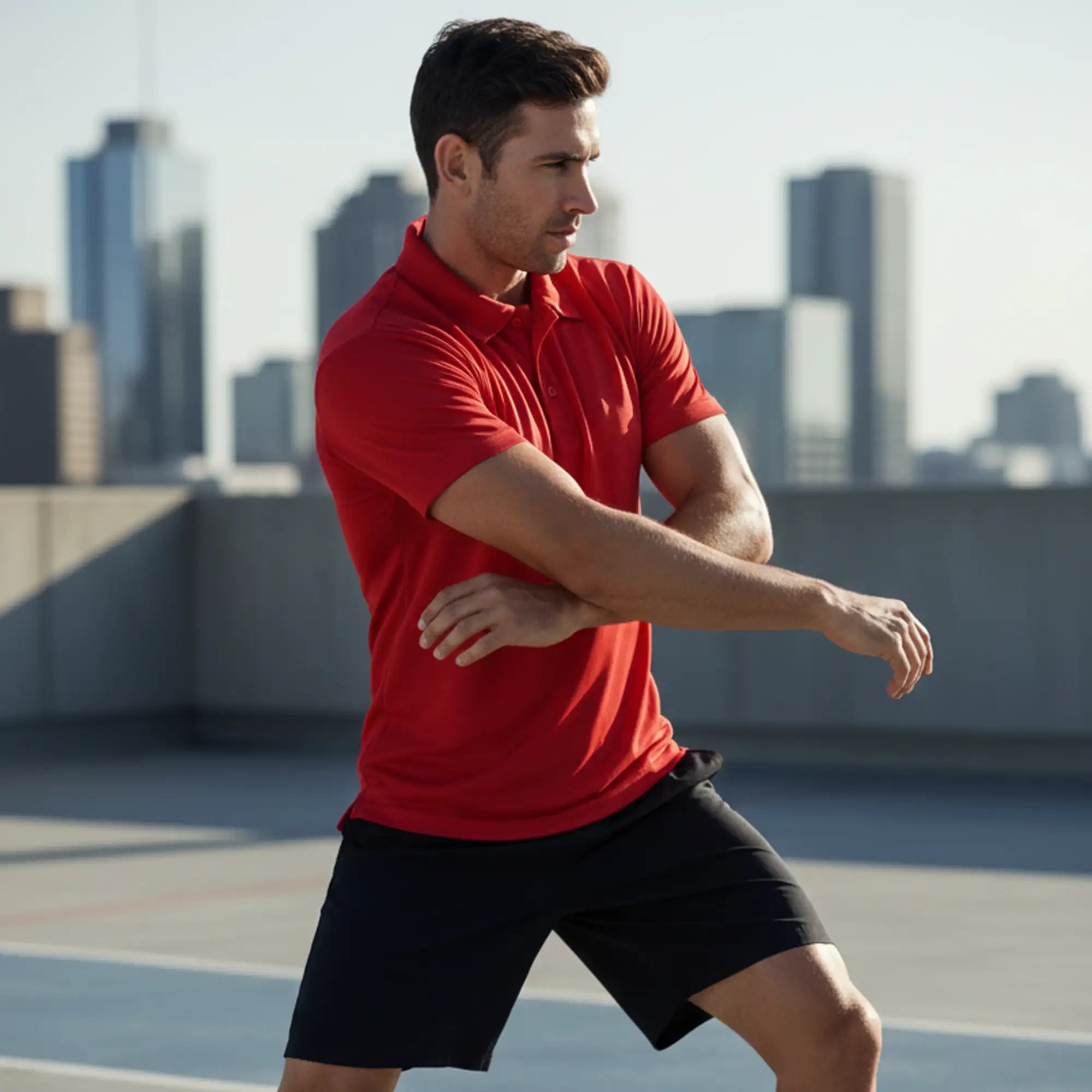 A vibrant red, short-sleeved polo shirt with a classic collar and button placket.