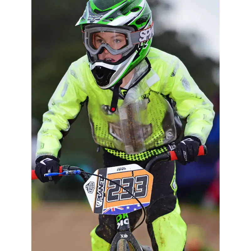 BMX racer in protective gear.