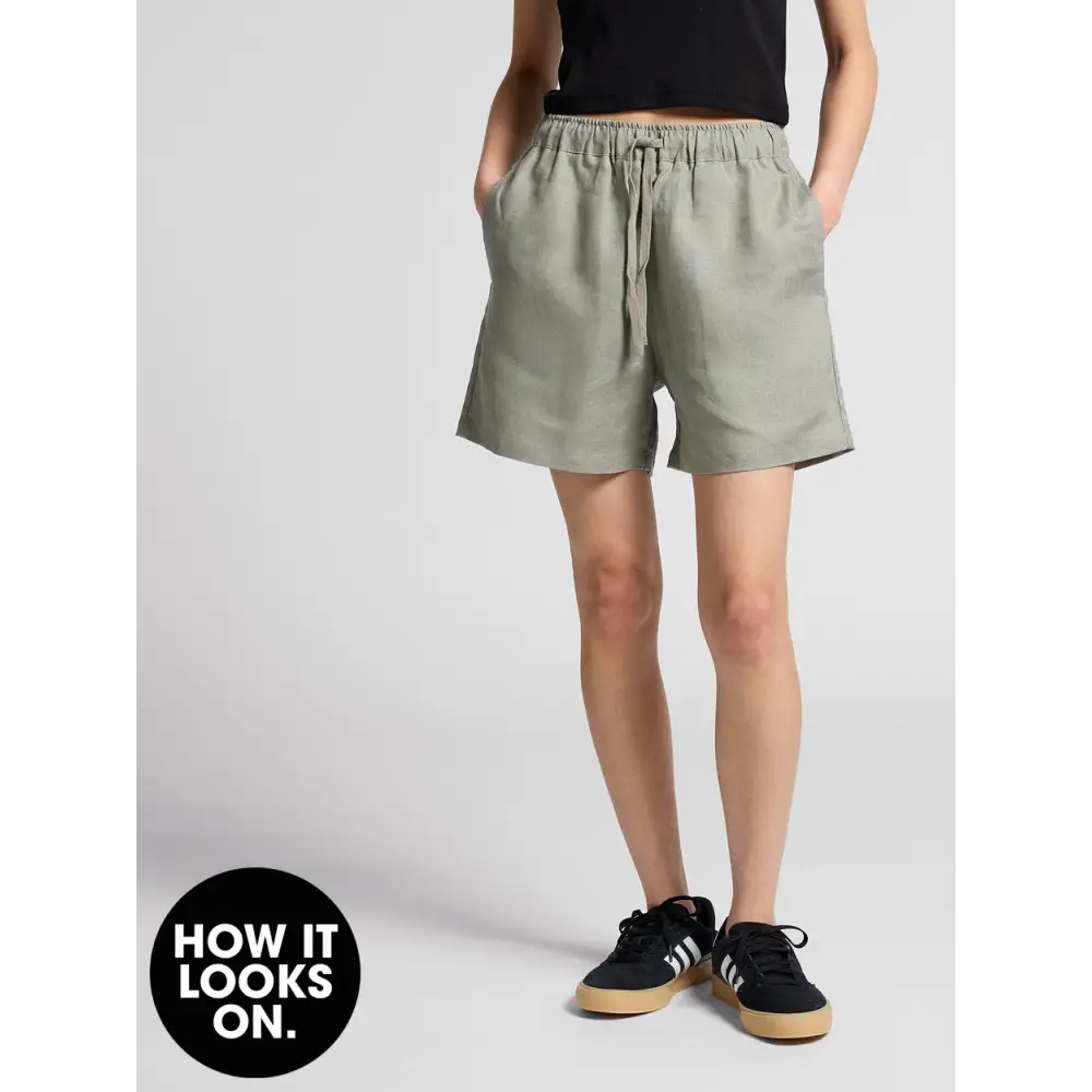 Olive-green drawstring shorts.