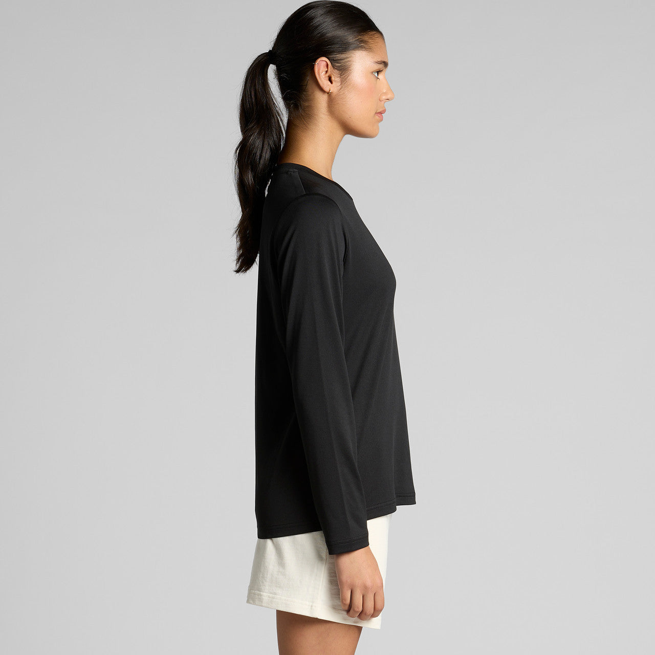 Black long-sleeved athletic top with ribbed cuffs and hem, likely made of polyester or cotton blend.