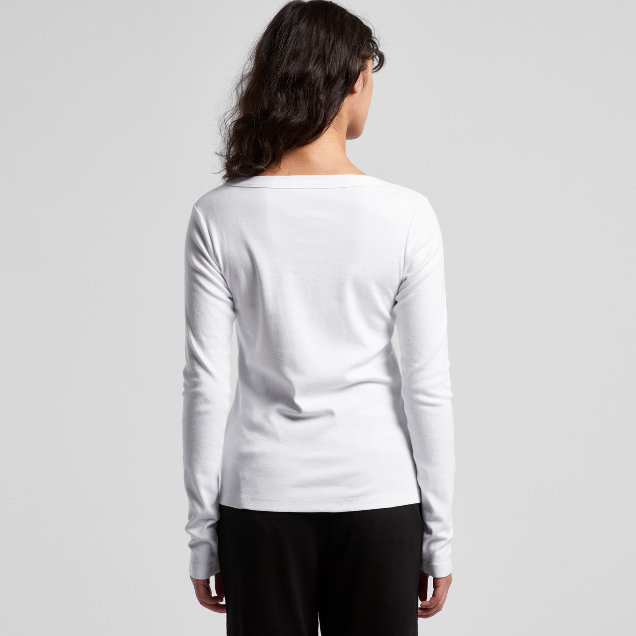 White long-sleeved shirt with boat neckline and ribbed cuffs.