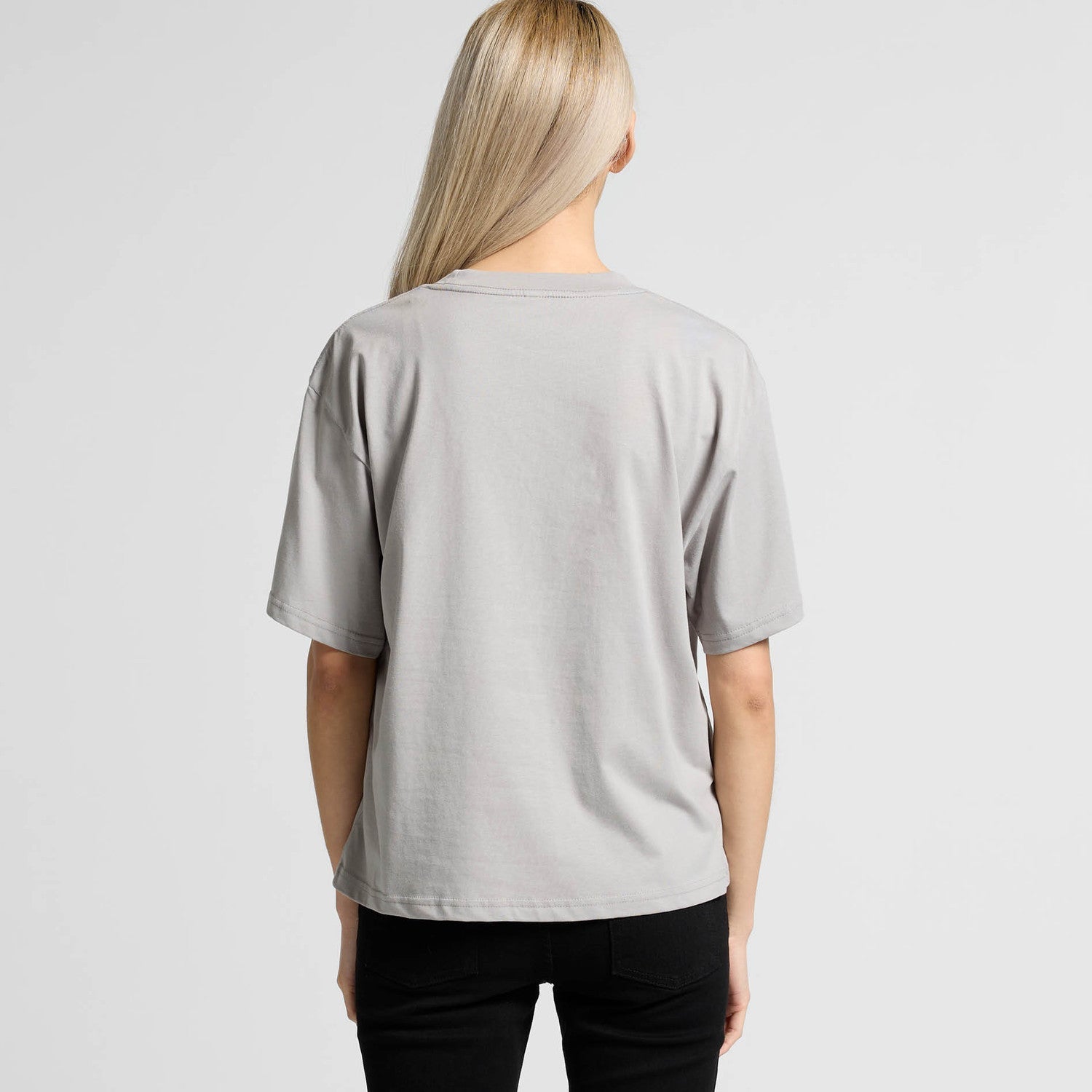 Light gray oversized t-shirt with a relaxed fit and short sleeves.