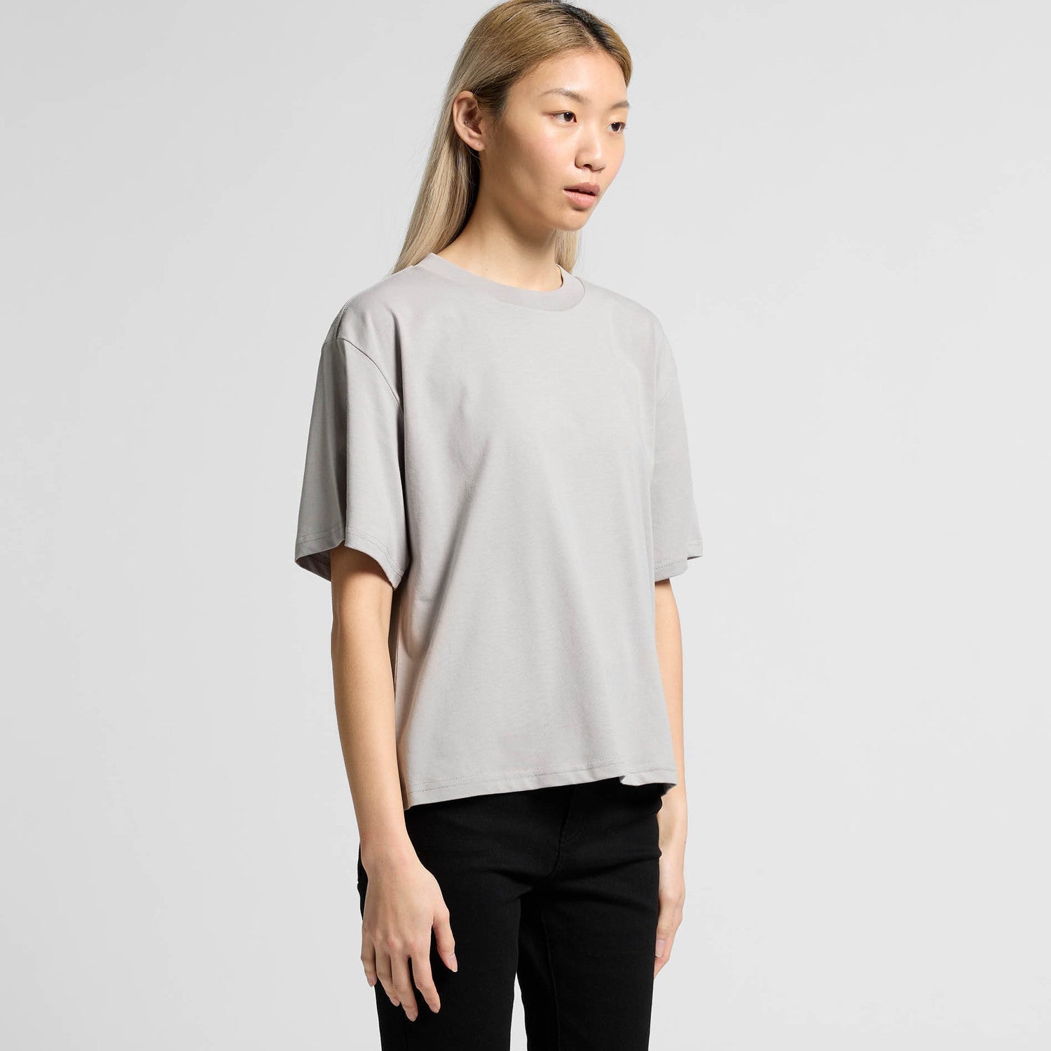 Light gray oversized t-shirt with short sleeves and a relaxed fit.
