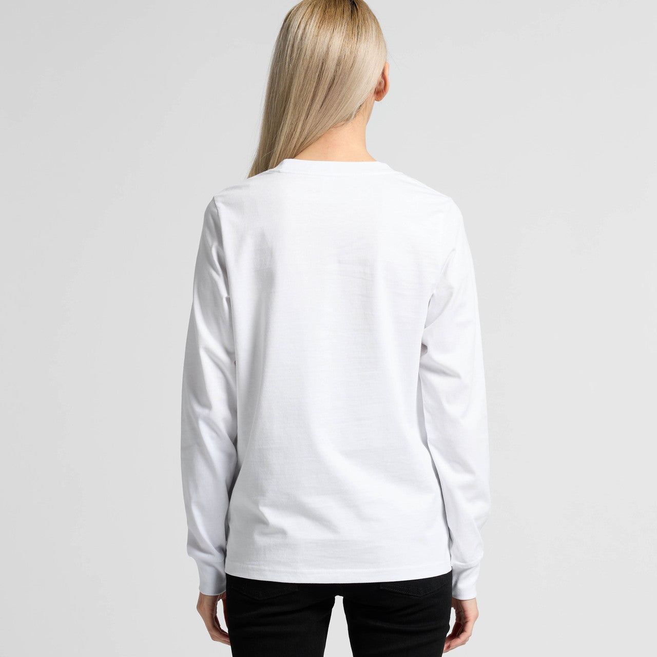 White long-sleeved crew neck t-shirt with a subtle logo on the back.