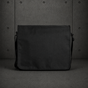 Recycled Messenger Bag 1027 blank product on dark industrial concrete background