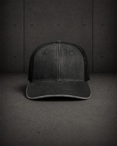 Stock Faded Trucker 1102 blank product on dark industrial concrete background