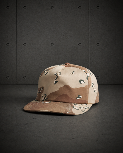 Surf Cotton Camo Cap 1119C blank product on dark industrial concrete background