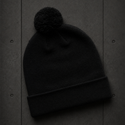 Pom Pom Beanie 1124 blank product on dark industrial concrete background