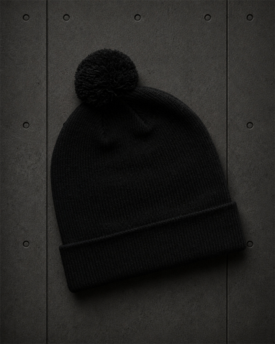Pom Pom Beanie 1124 blank product on dark industrial concrete background