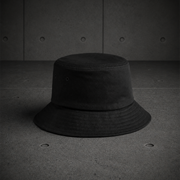Kids Bucket Hat 1170 blank product on dark industrial concrete background