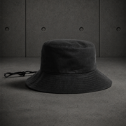 Wide Brim Bucket Hat 1172 blank product on dark industrial concrete background