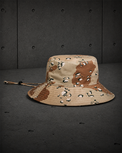 Wide Brim Camo Bucket Hat 1172C blank product on dark industrial concrete background