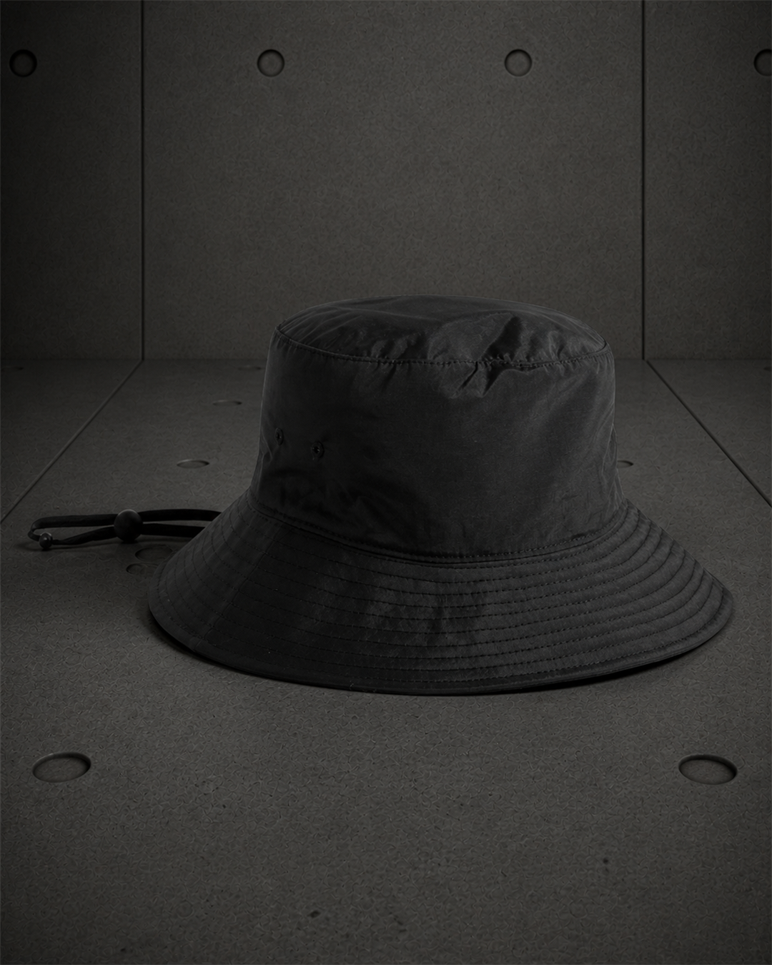 Nylon Wide Brim Bucket Hat 1174 blank product on dark industrial concrete background