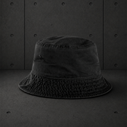 Faded Bucket Hat 1181 blank product on dark industrial concrete background