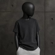 Kids Heavy Faded Tee 3070 blank product on dark industrial concrete background