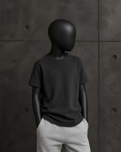 Kids Heavy Faded Tee 3070 blank product on dark industrial concrete background