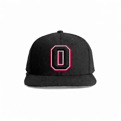 Black snapback cap featuring a bold pink and white embroidered letter ’o’ on the front.