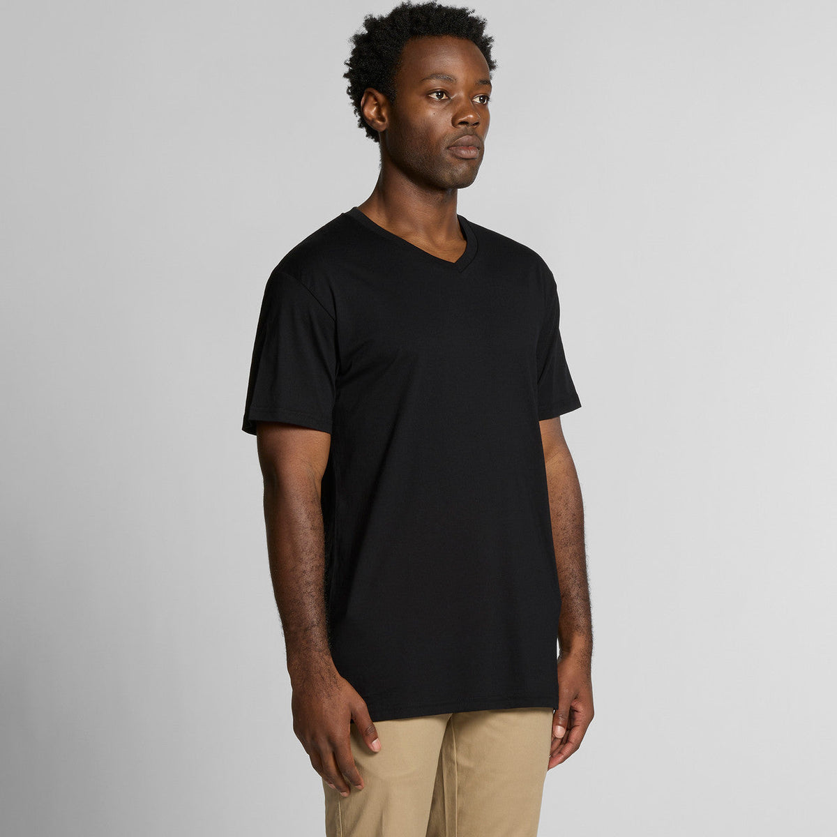 Black v-neck t-shirt with short sleeves and ribbed neckline, made of cotton.